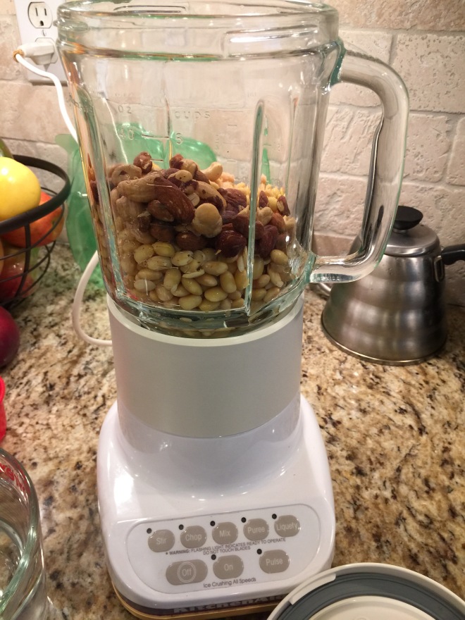 Put soy beans, salt, mixed nuts in the blender